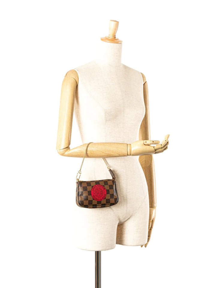 Pre-OwnedLouis Vuitton Pre-Owned2008 Damier Ebene Trunks and Bags Mini Pochette Accessoires handbag