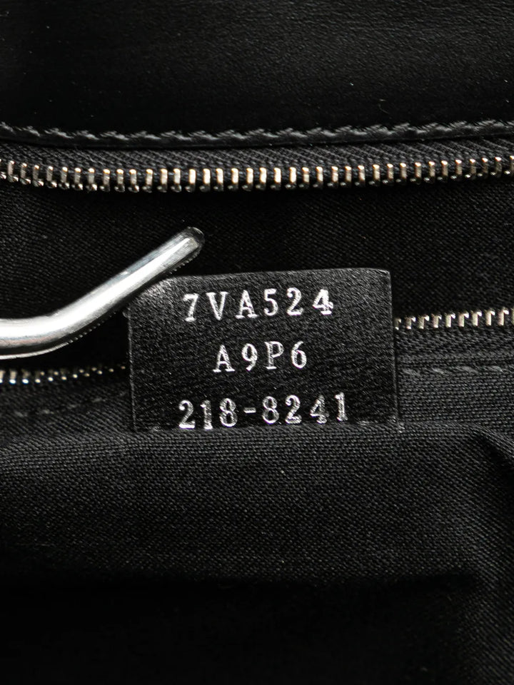 Pre-OwnedFendi Pre-Owned2010-2025 Calfskin and Canvas FF 1974 Flat Baguette crossbody bag