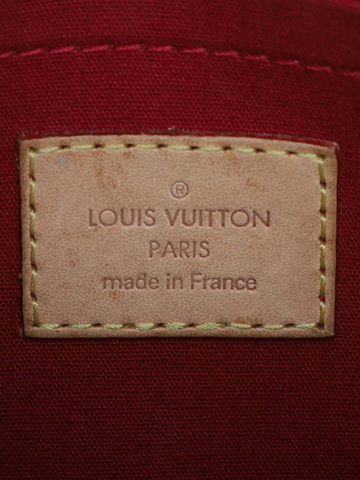 Pre-OwnedLouis Vuitton Pre-Owned2011 Monogram Vernis Bellflower PM crossbody bag
