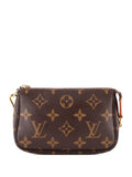 Pre-OwnedLouis Vuitton Pre-OwnedPochette Accessoires Monogram Canvas Mini clutch bag
